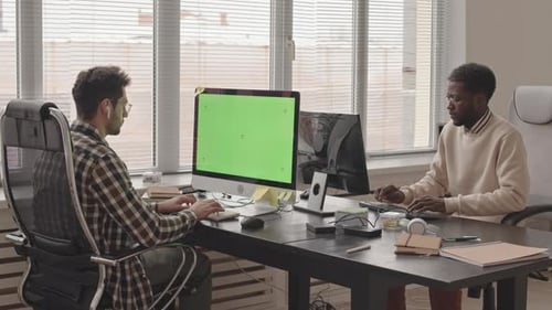 Software Engineers Working in Office