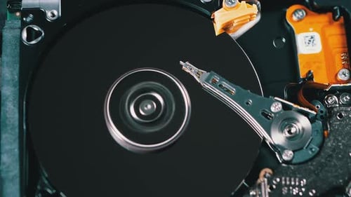 Hard Disk Drive Inside. Structure of HDD, Spinning Platter. Move Magnetic Head