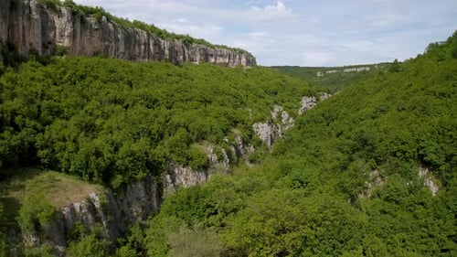 Drone flight over a picturesque river canyon