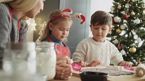Family Baking Christmas Cookies at Home Together