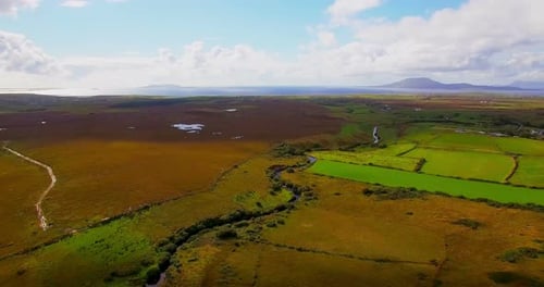 Aerial of green farmland