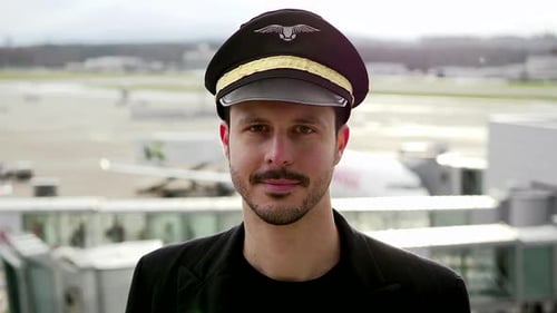 Pilot Posing for the Camera at Airport