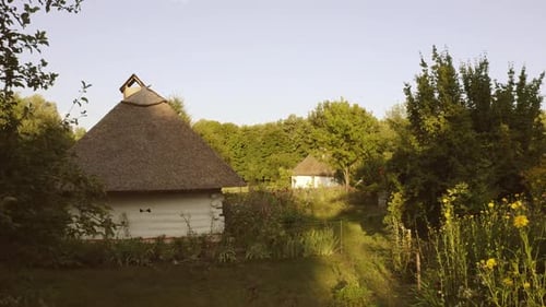 Traditional White Hut Houses with Straw Roofs