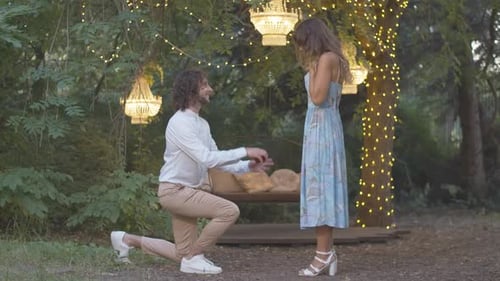 Romantic Proposal in a Fairy-Lit Woodland Setting