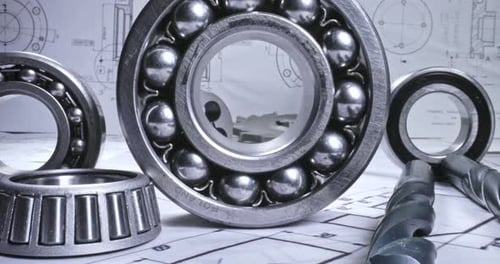 Mechanical diagrams, drill and bearings. Designer desk of mechanical parts.