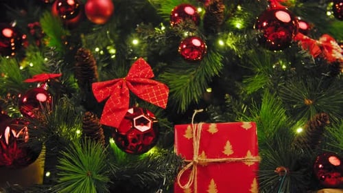 Festive Christmas Tree with Red Ornaments and Gifts