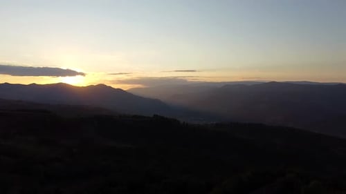 Sunset Scenic Landscape Over Mountains, Aerial View