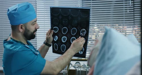 Doctor Explains Brain Scan to Patient in Hospital