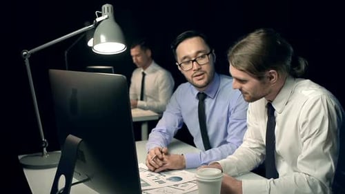 Business people discussing data