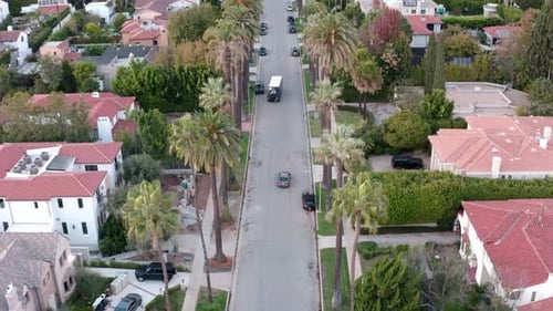 Aerial tilt to reveal Beverly Hills neighborhood from birds eye point of view