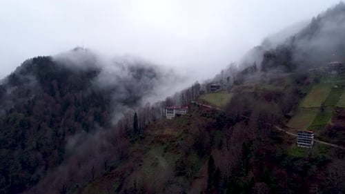 House and Fog Cloud at High Altitude