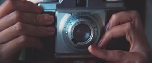 Picture being taken, camera from the front