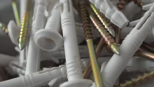Close Up of Wall Anchors and Screws