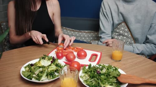 Friends Preparing Healthy Salad for Lunch Together