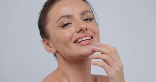 Attractive Woman Smiling and Posing Close Up