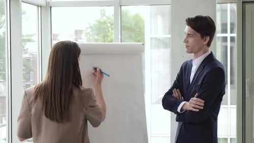 Corporate Professionals Brainstorming Ideas in Office