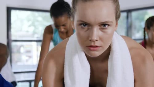 Working out on exercise bikes at a gym