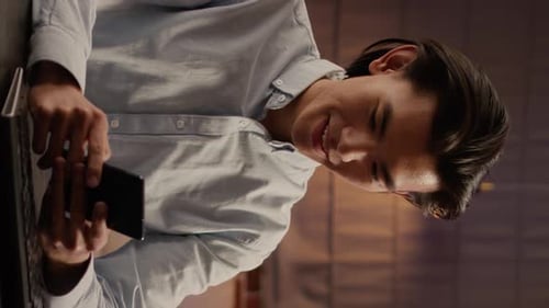 Young adult looking at phone