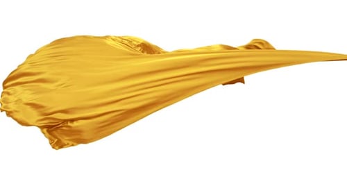 Yellow fabric flowing on white background, Slow Motion
