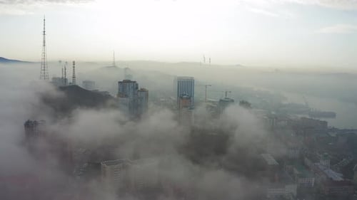 The Mystical Morning City of Vladivostok with Houses Shrouded in Fog