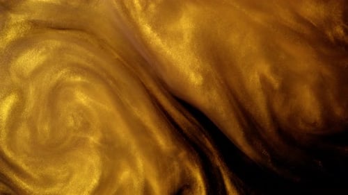 Goldene Tinte oder Staub erzeugt abstrakte Wolkenformationen. Hintergründe der Kunst
