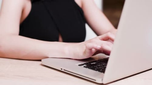 Close Up of Person Typing on Laptop Computer