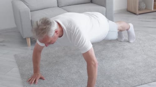 Senior Man Doing Push Ups at Home