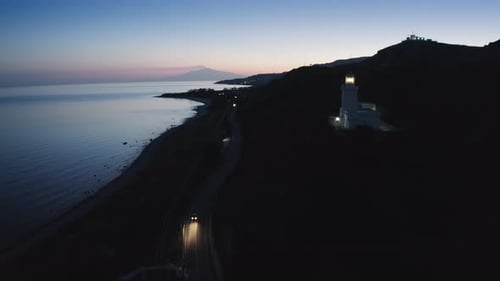 Lighthouse By Night
