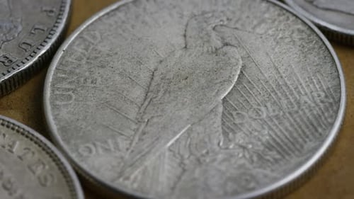 Rotating stock footage shot of antique American coins