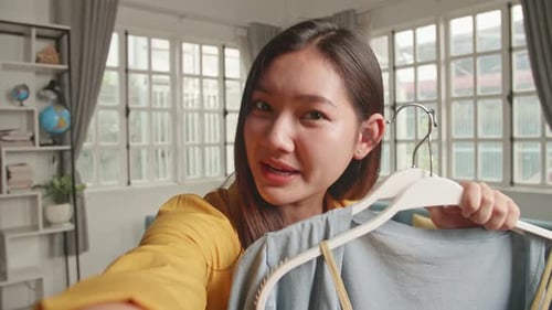 Young Woman Vlogging About Fashion and Clothing