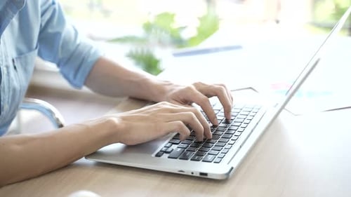 businessman typing a computer keyboard, working at the office or work from home, online work