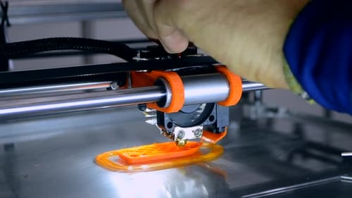 Close Up of 3D Printer Creating Object