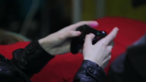 Hands Playing Video Game with Controller Close Up