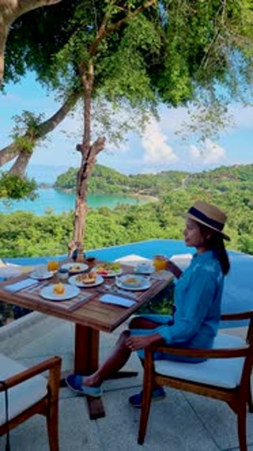 Breakfast on the Beach in Thailand a Luxury Breakfast Table with Food and Beautiful Tropical Sea