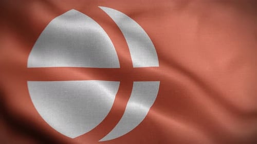 Abstract Circular Emblem Waving on a Red Fabric Flag