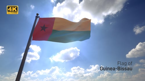 Guinea-Bissau Flag Waving Against Sunny Sky with Clouds