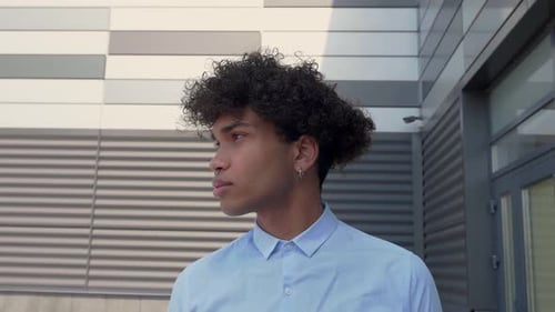 Portrait of Attractive Cheerful African American Man Stands in City Street Smile Happy Young