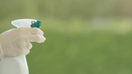 Hand in Glove Sprays Cleaning Solution Outdoors
