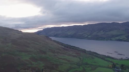 Panoramic Aerial View of a River In Between Mountain Landscape