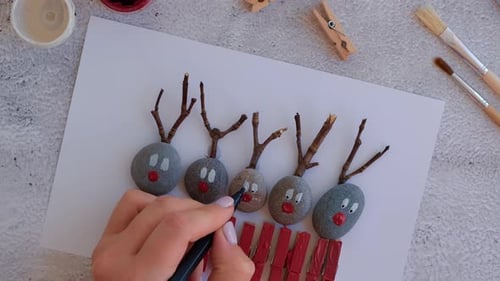 Making Diy Merry Christmas Deer on Greeting Card Postcard Made of Pebbles Sea Stones Clothespins and