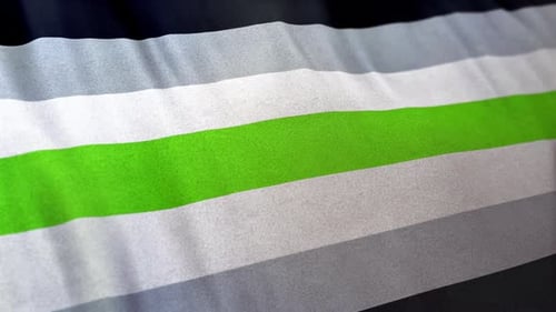 Abstract Waving Striped Fabric Background with Green Accent