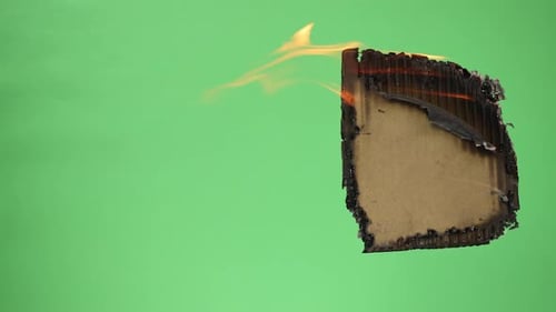 Burning Cardboard on Green Screen Background