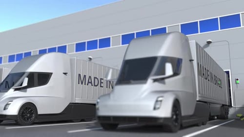 Trucks with MADE IN BRAZIL Text at Warehouse