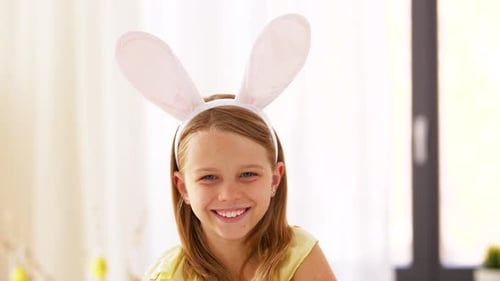 Smiling Girl with Easter Bunny Ears Headband
