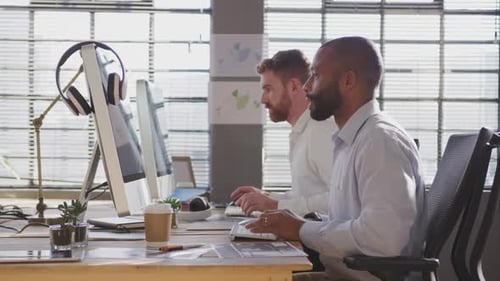 Young creative professionals working in a modern office