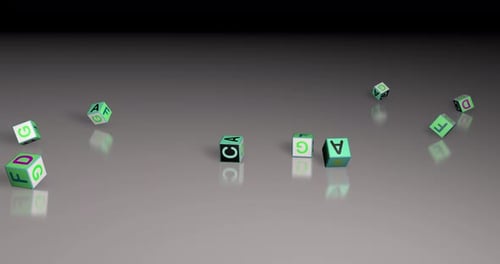 3D-Würfel mit angehängtem englischen Alphabet auf dem Würfel.