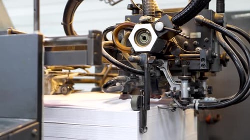 Printing Press Machine Prints White Paper Stack