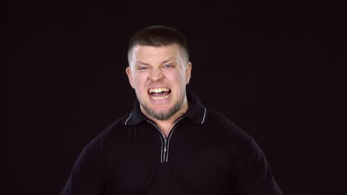 Man Yelling Aggressively with Intense Emotion
