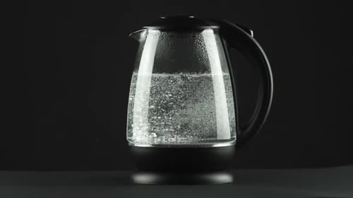 Boiling Water in Clear Glass Electric Kettle