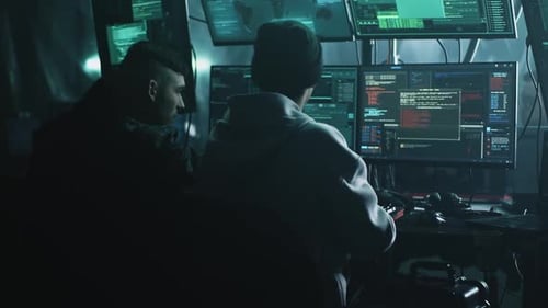 Programmer Hackers Working on Computer